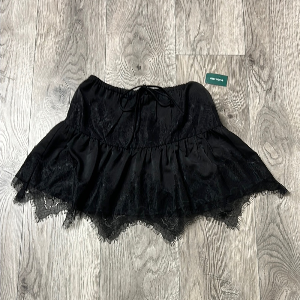 Simply Styled Black Bubble Mini Skirt with Ruffled Asymmetrical Design